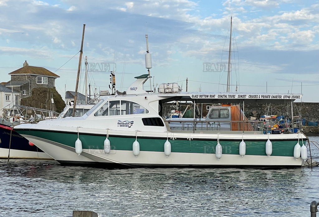 Evolution 38 (GLASS BOTTOM BOAT)